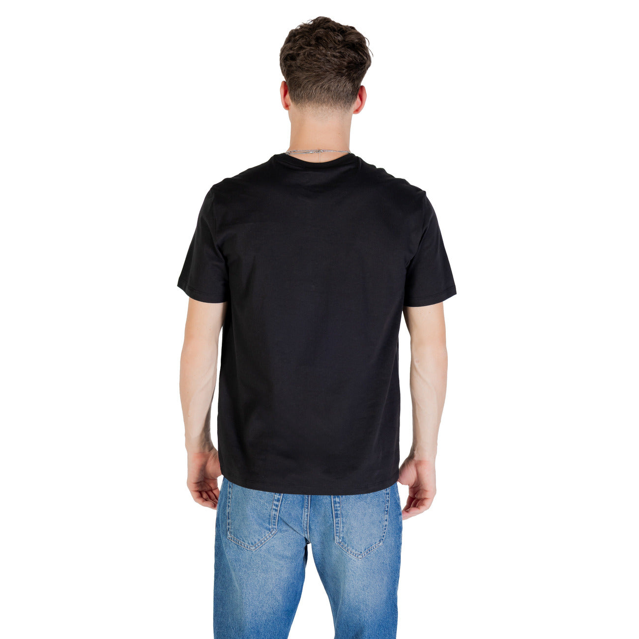 Men's Calvin Klein Jeans T-Shirt shown from the back, featuring a classic black design and relaxed fit.
